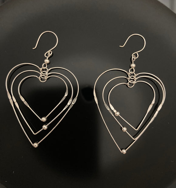 Aretes Corazones Plata .925