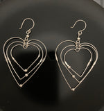 Aretes Corazones Plata .925